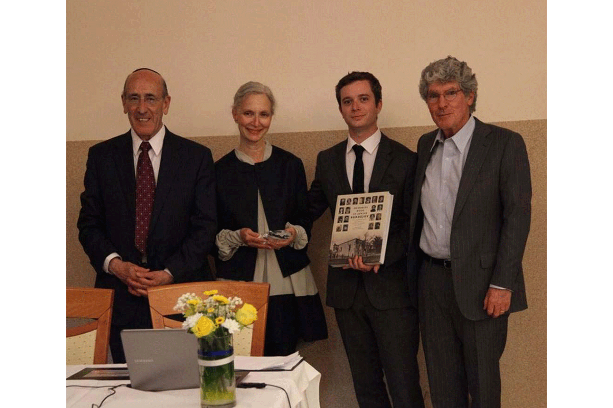 The Friedman family receive their award and Memorial Book