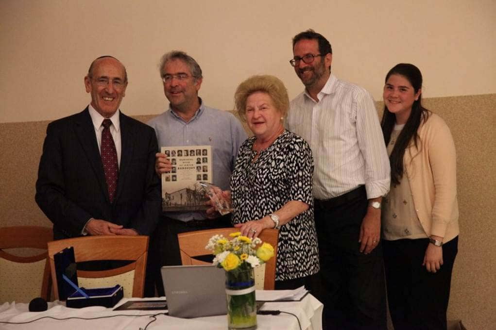 The Rosenbaum family receive their award and Memorial Book