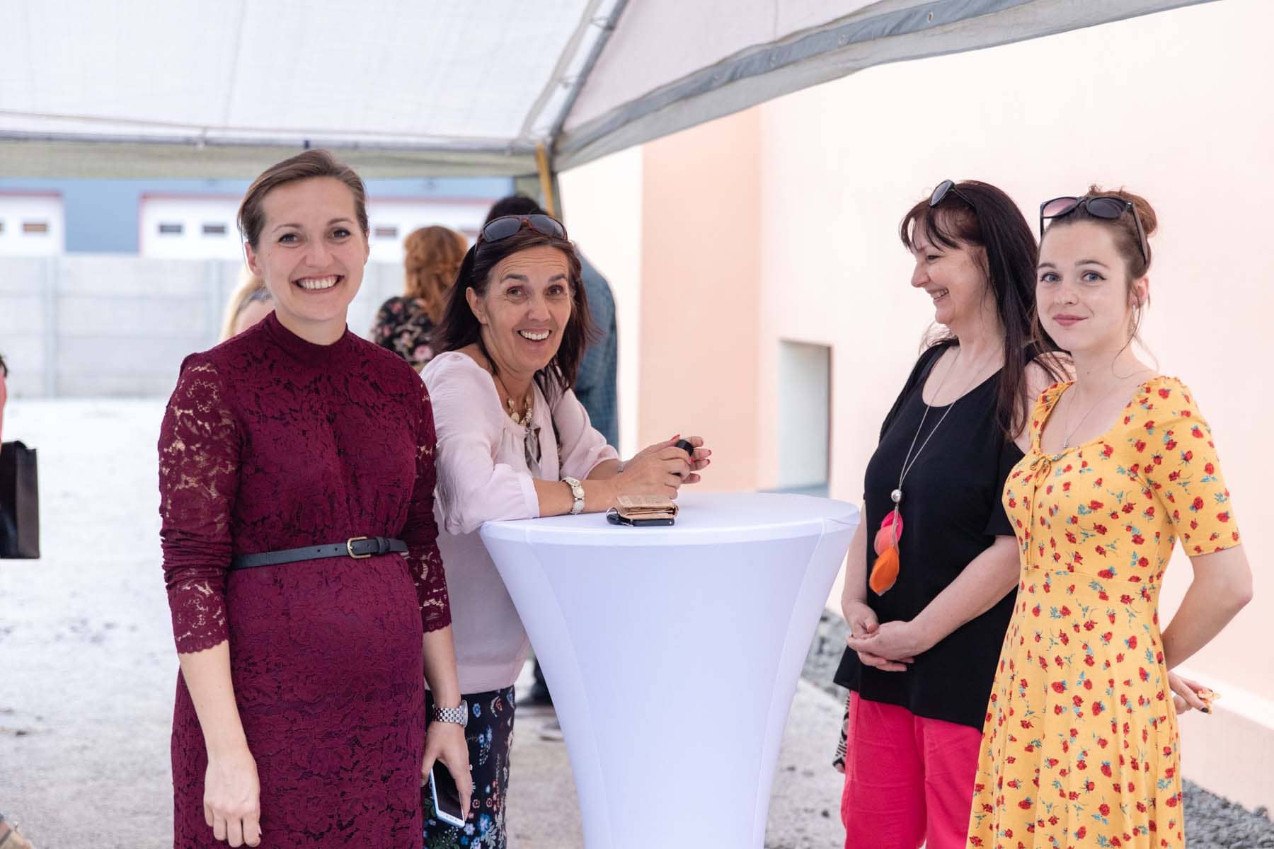 Ms. Anna Humbert (left) with guests of the event