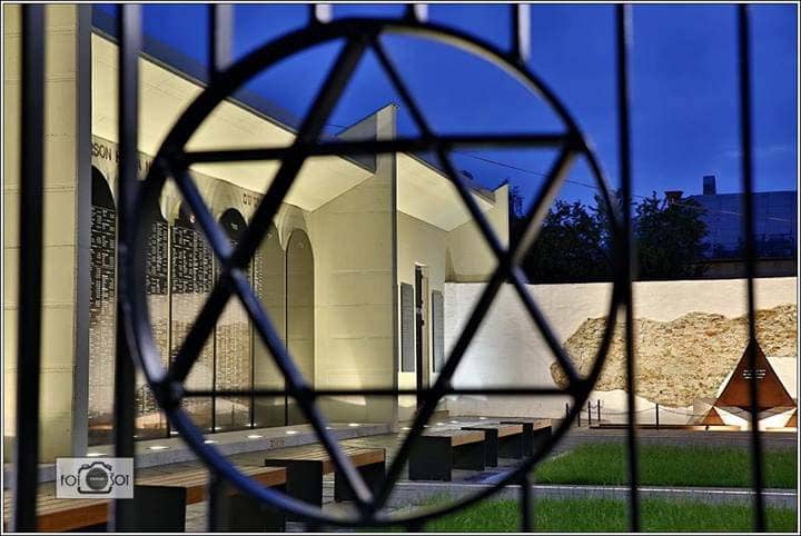 View of the Memorial through a Star of David motif on the gates of the complex