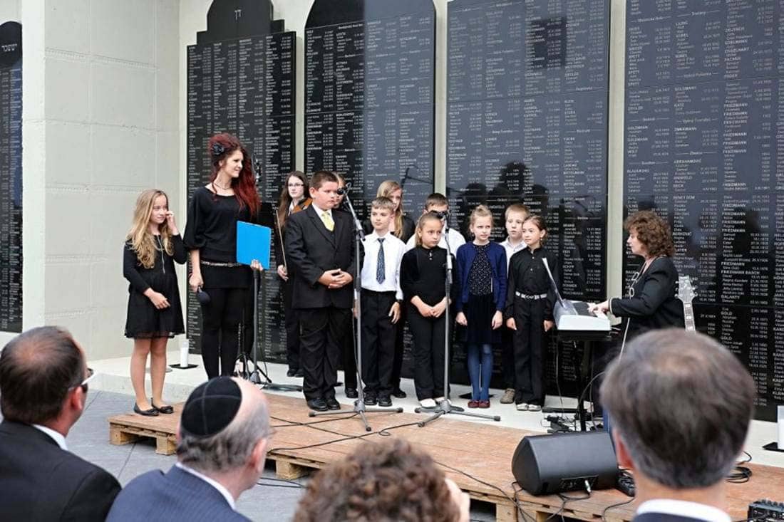 Local Children Choir sing in Hebrew 'Every Person has a Name', by Zelda Schneersohn Mishkovsky at the Dedication Ceremony